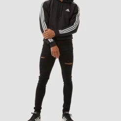 Coupon ???? Adidas Essentials 3-Stripes Fleece Trui / Hoodie - Zwart Heren - Maat S ❤️ -Rogelli Shop 550x629 1